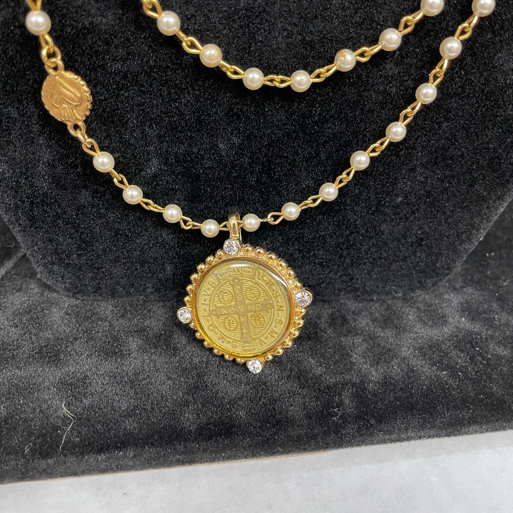 Vsa | Virgins Saints & Angels Tres Gracias Cloister Magdalena necklace and case.